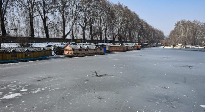 The Dal lake, located in the Srinagar district of Kashmir, is frozen, and numerous visitors are arriving at the spot to explore the freezing lake. It's an urban lake and the second-largest lake in Jammu and Kashmir The Dal lake, located in the Srinagar district of Kashmir, is frozen, and numerous visitors are arriving at the spot to explore the freezing lake. It's an urban lake and the second-largest lake in Jammu and Kashmir