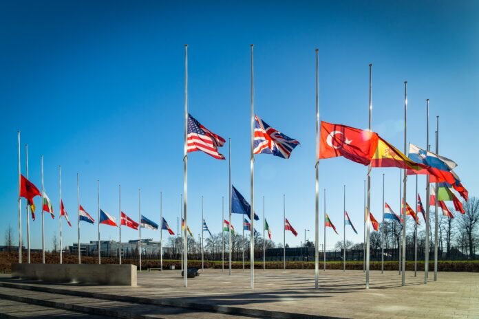 The NATO flag and the flags of its members lowered to half-mast outside the NATO headquarters in Brussels, Belgium to show support for their ally Turkey, which is experiencing severe difficulties as a result of three consecutive earthquakes that have shaken the country The NATO flag and the flags of its members lowered to half-mast outside the NATO headquarters in Brussels, Belgium to show support for their ally Turkey, which is experiencing severe difficulties as a result of three consecutive earthquakes that have shaken the country