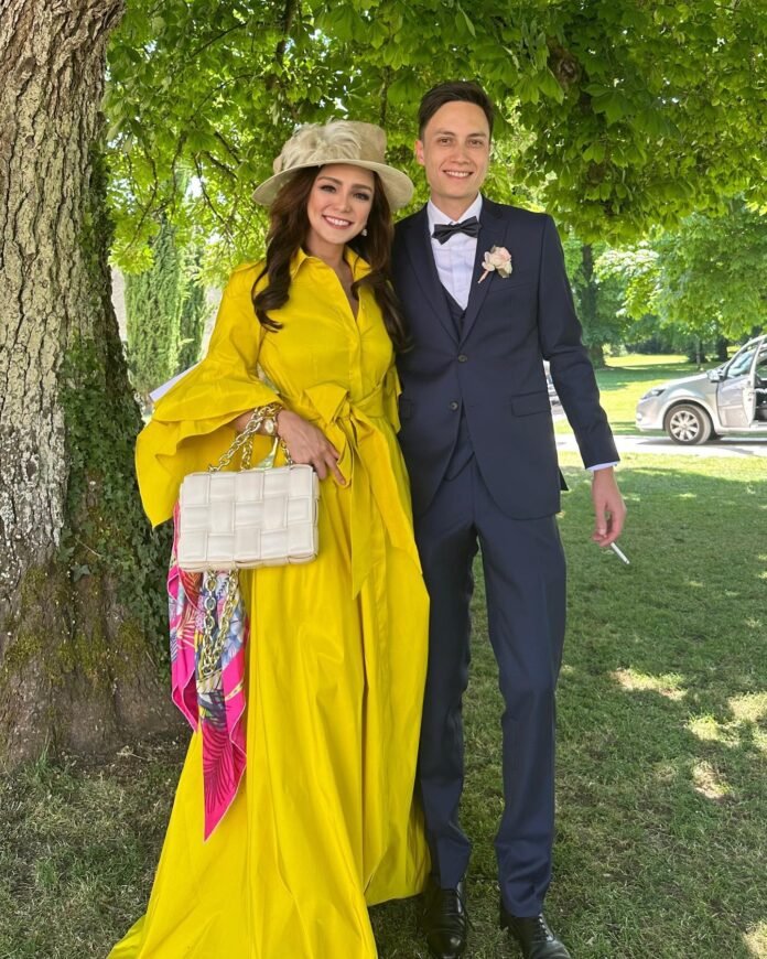 France-based Rikki K Mathey attends Grand Wedding in a beautiful magnifique yellow dress