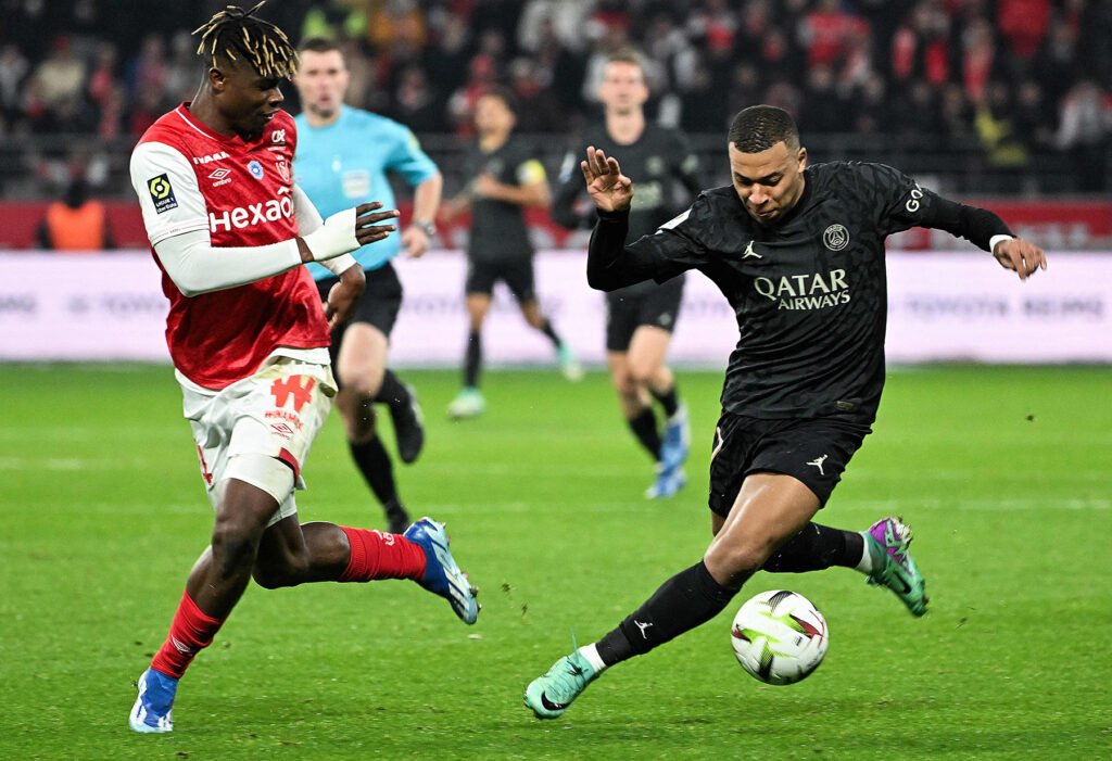 The electric atmosphere at the Parc des Princes ignited with Mbappe's swift opener, a volleyed spectacle from the edge of the area that left Reims' Yehvann Diouf grasping at thin air. The third-minute strike set the tone for a night that would echo with Mbappe's brillianceThe electric atmosphere at the Parc des Princes ignited with Mbappe's swift opener, a volleyed spectacle from the edge of the area that left Reims' Yehvann Diouf grasping at thin air. The third-minute strike set the tone for a night that would echo with Mbappe's brilliance