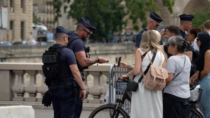 Up to 75,000 police officers, soldiers, and private security guards are on patrol in Paris, managing a complex web of road closures, metro station shut-downs, and security checkpoints Up to 75,000 police officers, soldiers, and private security guards are on patrol in Paris, managing a complex web of road closures, metro station shut-downs, and security checkpoints