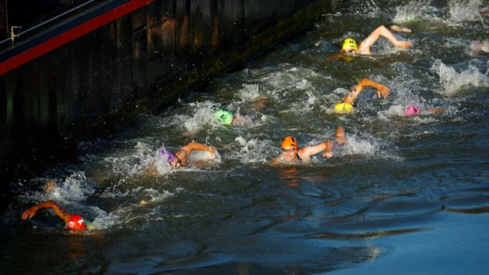 The decision to consolidate all 11 medal events into a single day was made due to unfavorable weather forecasts that have raised concerns about water quality in the Seine River