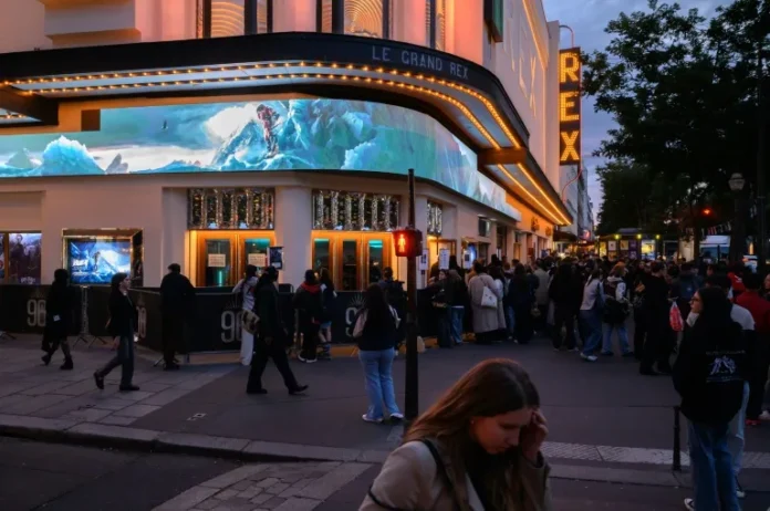 Fans queued to watch French YouTuber Ines Benazzouz's Everest documentary at the famous Rex theatre in Paris (Ed JONES) (Ed JONES/AFP/AFP)