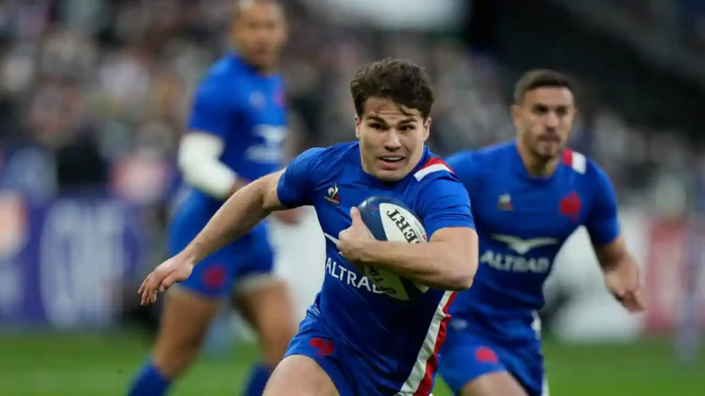 Antoine Dupont of France runs onto score a try during the Six Nations international rugby match between France and Ireland, at the Stadium de France in Saint Denis, Paris, France, Saturday, 12 February 2022. AP - Francois Mori