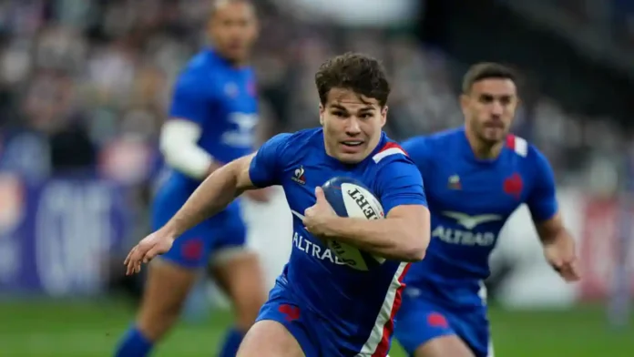 Antoine Dupont of France runs onto score a try during the Six Nations international rugby match between France and Ireland, at the Stadium de France in Saint Denis, Paris, France, Saturday, 12 February 2022. AP - Francois Mori