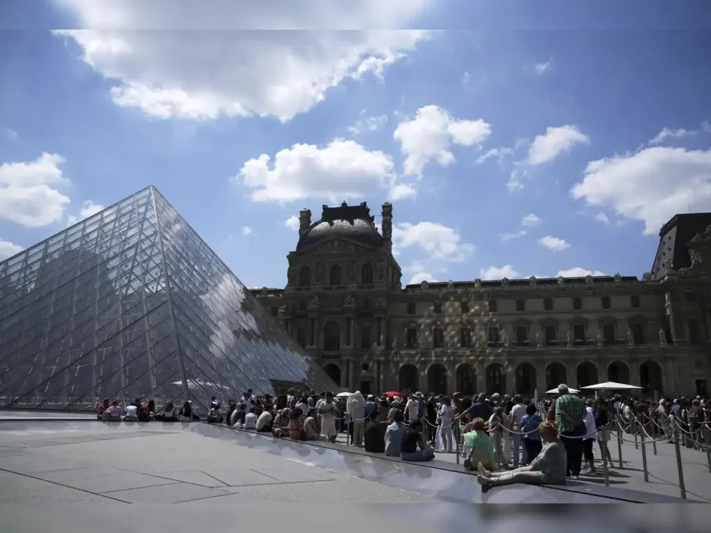 Whether the Mona Lisa smiles, frowns, or sighs beneath her glass case – for now, at least, she remains silent