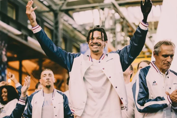 French Paralympic athletes engaged with fans during Paralympic Day in Paris, marking one year since the 2024 Games