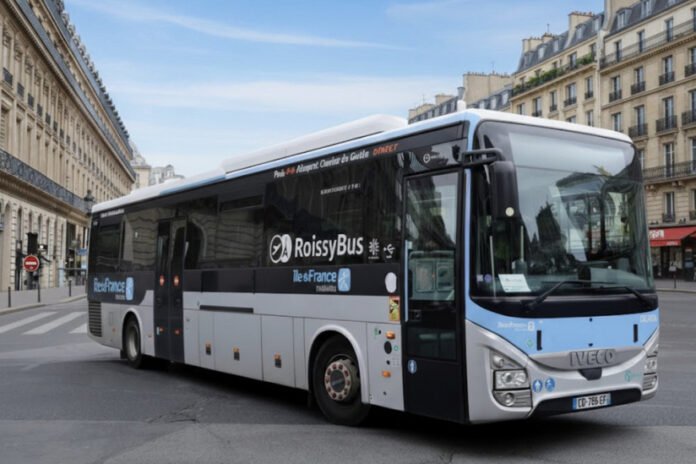 A RoissyBus prepares for departure in Paris, as the long-running airport shuttle faces permanent withdrawal in 2026
