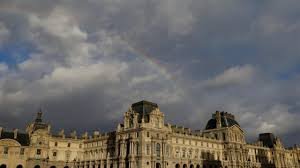 A Louvre storage room after the leak, where staff work swiftly to protect rare books from water damage A Louvre storage room after the leak, where staff work swiftly to protect rare books from water damage