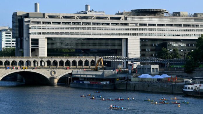 Paris skyline reflects economic uncertainty as inflation rises and growth slows amid global energy market disruptions affecting households and businesses