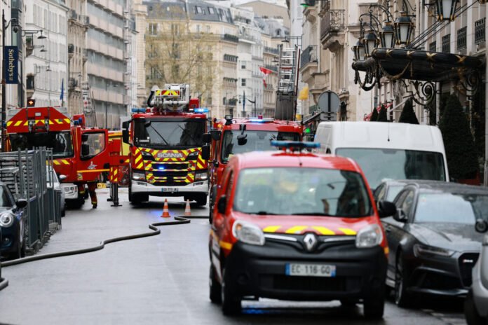 Firefighters respond to a hotel blaze in central Paris as hundreds evacuate safely amid heavy smoke near the Élysée Palace district. Credits: AFP